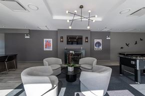 Chicago apartment for rent - A room with grey walls and a pool table.