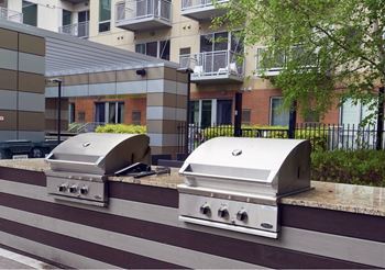 Outdoor entertainment lounge with grilling stations