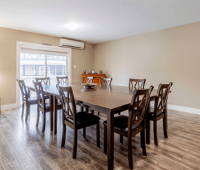 Fredericton apartment for rent - A dining room with a table and chairs.