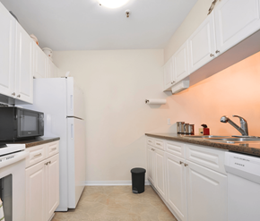 Halifax apartment for rent - A kitchen with white cabinets and appliances.