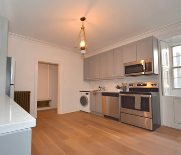 Halifax apartment for rent - A kitchen with a white counter top and stainless steel appliances.