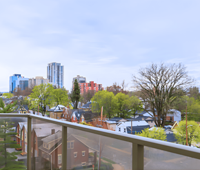 London apartment for rent - A view of a residential area with houses and trees.