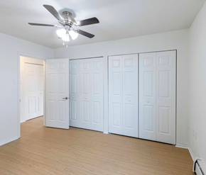 Saint John apartment for rent - A room with a ceiling fan and white walls.
