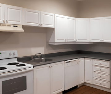 Halifax apartment for rent - A kitchen with white cabinets and appliances.