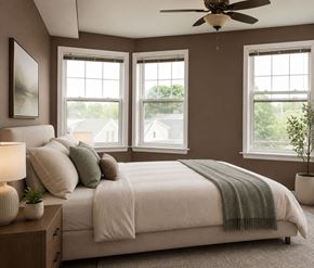Halifax apartment for rent - A bedroom with a large bed and a ceiling fan.
