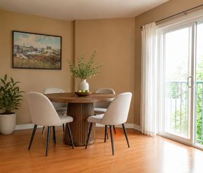 Halifax apartment for rent - A dining room with a table set for four and a painting on the wall.
