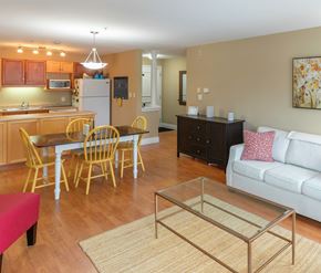 Moncton apartment for rent - A kitchen with a dining table and chairs.