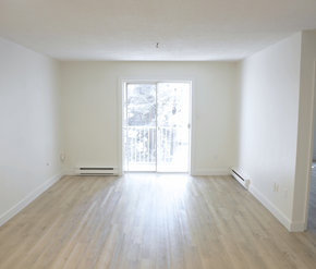 Halifax apartment for rent - A room with a sliding glass door leading to a balcony.