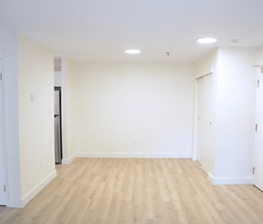 Halifax apartment for rent - A room with wooden flooring and white walls.