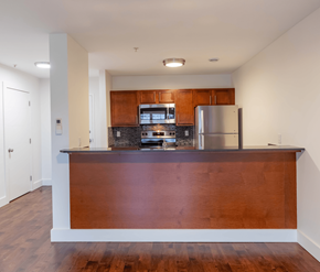 Saint John apartment for rent - A kitchen with a wooden counter and stainless steel appliances.