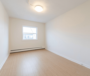 Saint John apartment for rent - A room with a window and a white ceiling.