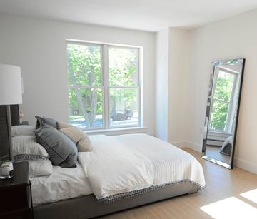 Halifax apartment for rent - A bedroom with a large bed and a large window.