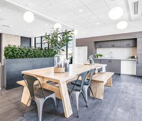 Kitchener apartment for rent - A modern dining area with a wooden table and chairs.