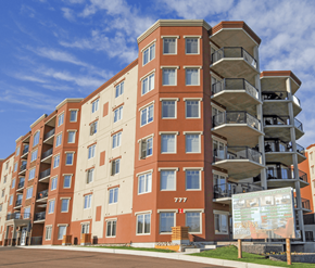 Dieppe apartment for rent - A large apartment building with the number 777 on the front.