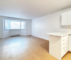 Moncton apartment for rent - A room with a window and a counter.