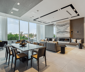 Ottawa apartment for rent - A modern dining room with a large table and chairs.