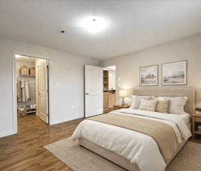 Dieppe apartment for rent - A bedroom with a large bed and a wardrobe.