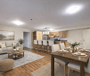 Dieppe apartment for rent - A dining room with a table set for four.