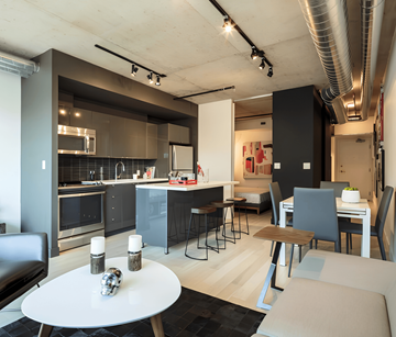 Halifax apartment for rent - A modern kitchen with a dining table and chairs.