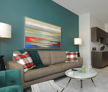 Dartmouth apartment for rent - A living room with a couch, a coffee table, and a painting on the wall.