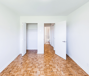 St. John's apartment for rent - A room with a wooden floor and white walls.