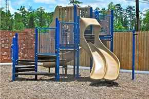 Vidor apartment for rent - a playground with a slide and monkey bars