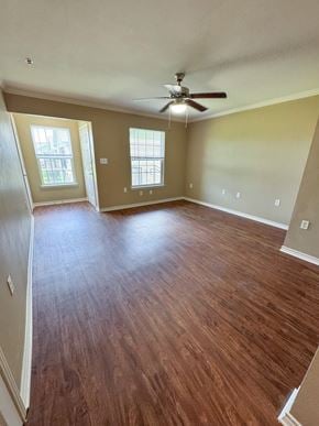 Freeport apartment for rent - A room with wooden floors and a ceiling fan.