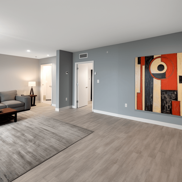 Port Arthur apartment for rent - a living room with gray walls and a gray rug