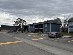 Beaumont apartment for rent - A grey car is parked in a parking lot.