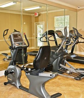 Beaumont apartment for rent - A gym with a treadmill, exercise bike and elliptical trainer.