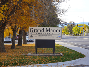 Grand Junction apartment for rent - A sign for Grand Manor Community reads  at Grand Manor Apartments , Grand Junction, CO