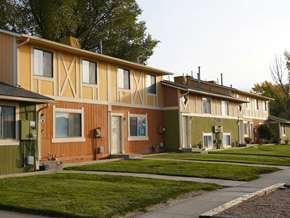 Clifton apartment for rent - A row of houses with green lawns in front at Willow Grove Apartments, Clifton, 81520.
