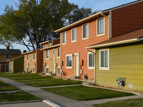 Clifton apartment for rent - A row of houses with green lawns in front at Willow Grove Apartments, Clifton, CO, 81520.
