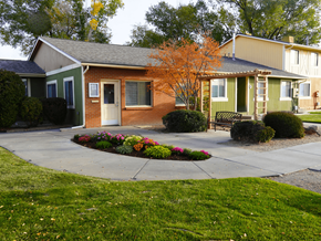 Clifton apartment for rent - A small house with a brown door and a white door at Willow Grove Apartments, Clifton, CO.