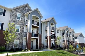 Florence apartment for rent - a row of apartment buildings with brick and stone exterior  at Parkway Trails, Florence, KY, 41042
