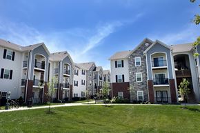 Florence apartment for rent - a row of apartment buildings on a sunny day at Parkway Trails, Florence