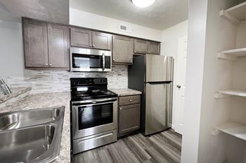 Kitchen with fully equipt appliances.