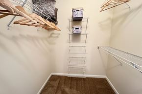 Columbus apartment for rent - spacious closet with shelves and hooks at the falls apartments at Residences at Northgate Crossing, Ohio, 43235