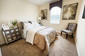 Columbus apartment for rent - the preserve at ballantyne commons bedroom with bed and chair at Residences at Northgate Crossing, Ohio, 43235