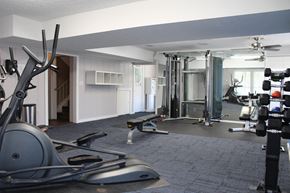 Cincinnati apartment for rent - a gym with weights and cardio equipment in a home gym  at Timber Ridge Apartments, Cincinnati, Ohio