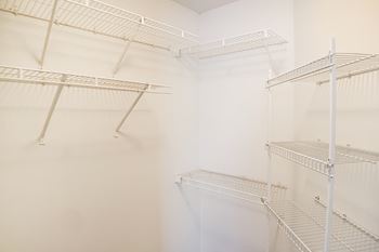 Generous walk-in closets with shelving