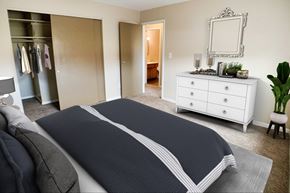 Cincinnati apartment for rent - Bedroom with cozy bed with cabinets at Sharondale Woods Apartments, Ohio