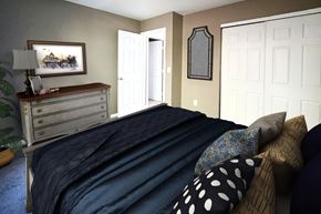 Hamilton apartment for rent - A bedroom with a bed, dresser, and mirror.