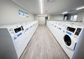 Forest Park apartment for rent - a washer and dryer laundry room with rows of washes and dryers  at Forest Park Apartments, Forest Park, Ohio