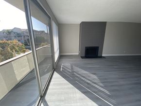 Los Angeles apartment for rent - 11858 Goshen Ave Unit 207 living room with fireplace and view