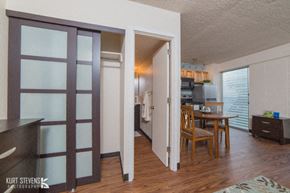 Honolulu apartment for rent - Kewalo Apartments dining and living area with decor, closet, and bathroom doorway