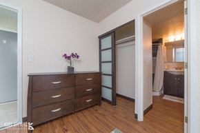 Honolulu apartment for rent - Kewalo Apartments living area with decor, closet, and bathroom doorway