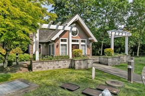 Kent apartment for rent - the front of a house with a yard and a patio