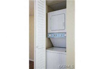 Monarch terrace laundry room with washer and dryer