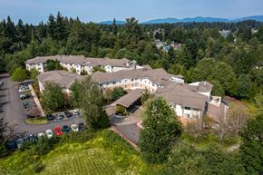 Kent apartment for rent - a aerial view of a large building surrounded by trees